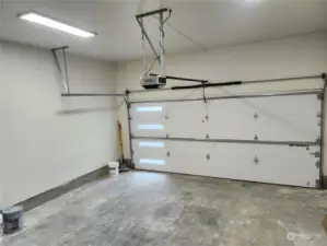 2 car garage with showcase insulated garage door