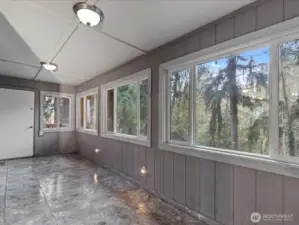 Sun room/mud room to the back yard