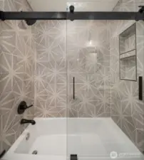 Beautiful tile and fixtures in main floor bath