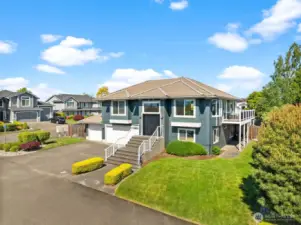 This stunning water view home sits high on the hill of Harbor Ridge Estates with panoramic views of the water