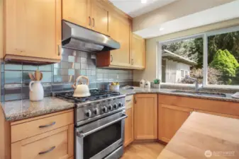 Dual-fuel gas range with electric oven.