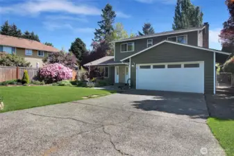 A long driveway and extra gravel to the side and rear yard offers plenty of parking and RV potential.