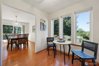 From the dining room is a breakfast area. To the right is the laundry room and garage entrance.
