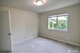The roomy 3rd bedroom is located at the back of the house.