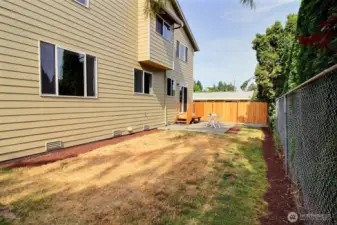 Just enough room to run and play or add a garden - maybe a little of both!