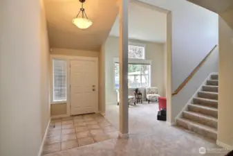 Easy care tiled entry is beautiful yet very functional in helping to keep the home clean.