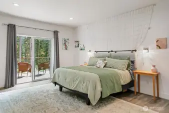 Primary Bedroom with private access to the Deck.  Reading Lights on both sides of the bed and also a wall mount for TV.