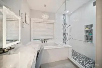 Exquisite tiled shower with shower stations at each end!