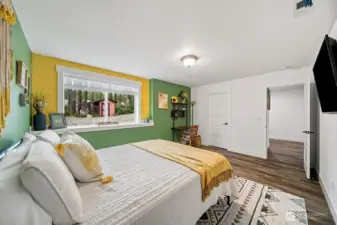 Bedroom 4 has a walk in closet, luxury vinyl flooring and a big window for maximum natural light.