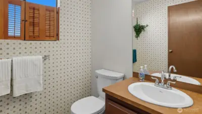 Convenient lower-level 1/2 bath for guests and everyday use.