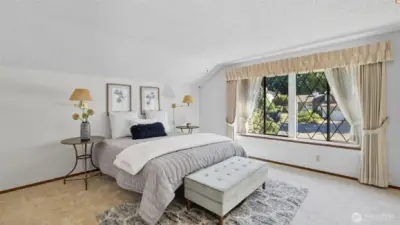 Enjoy quiet mornings and restful evenings in this bright, airy primary retreat upstairs.