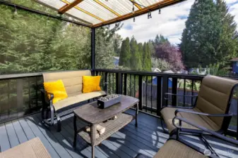 Sizable, covered backyard deck. Great place to sip your morning coffee or an afternoon refresher.