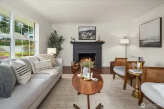 Living space with large windows allowing abundant natural light throughout.