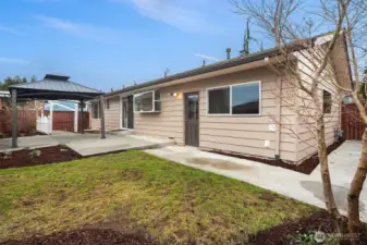 Back patio with access to garage.