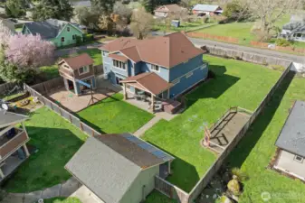 Beautiful and private property layout, yard space, and detached outdoor play or multi-use structure.