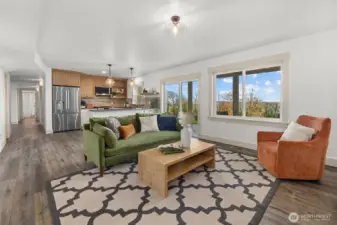 Amazing lower-level features full kitchen with bar seating, family room with custom fireplace, 2 large guest bedrooms, full size bath and utility room! Could easily be a MIL for multigenerational living!