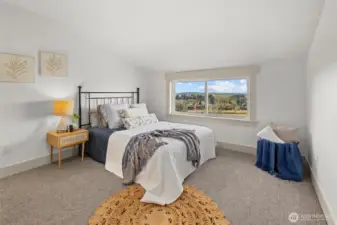 One of two identical upper-level guest bedrooms with views! Upper level also includes large bonus room, full guest bathroom and tons of closet space!