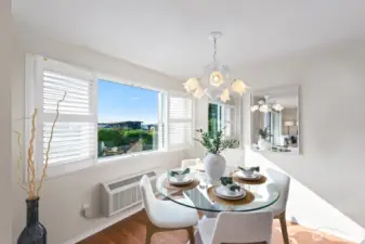 Loads of natural light fill this beautiful dining room.