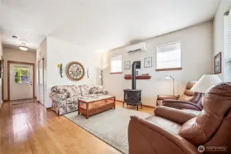 Another angle of living room looking towards back door.