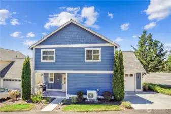 This home looks just as lovely from the back, as well.