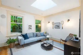 Family room and lounge that is open yet removed
