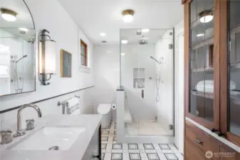 Love this tile! Steam shower, toto toilet, custom built-in's