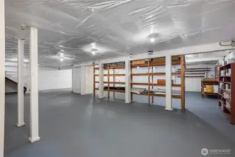High ceiling, unfinished basement with so much potential.