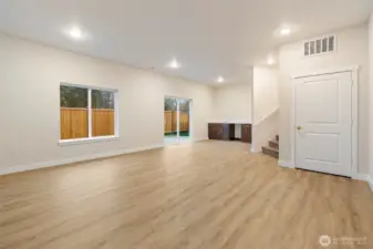 Basement living area w/ patio entry
