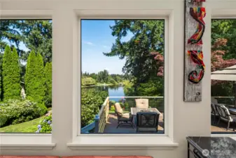 This picture looks out to the deck and the lake from the expanded kitchen area.