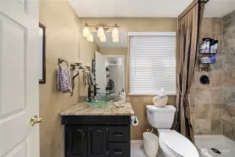 Beautifully updated 3/4 bath on the main floor.