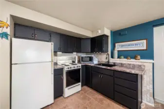 The lower level kitchen complete with cook stove and oven.