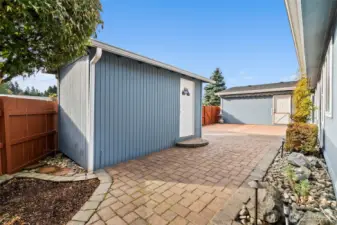 Covered patio with awning for year-round enjoyment and entertaining