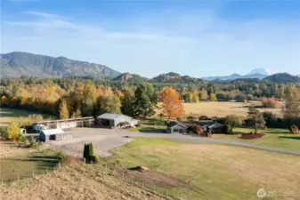~Welcome to this Entertainer’s DREAM property with stunning Mt. Rainier views & Creek Frontage~