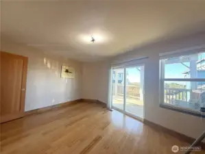 Primary Bedroom with Ocean Views and access to deck