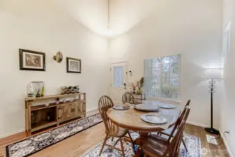 Gorgeous dining area with tall ceilings