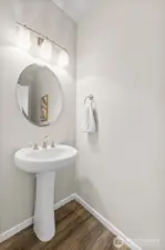 Hallway half bathroom for your visitors.
