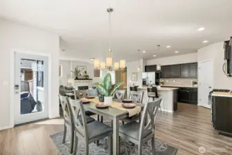 Large dining space with access to the back patio.