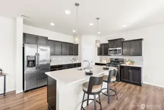 Large island and walk in pantry make this a chef's or entertainers kithen!