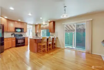 Eat-in Kitchen with slider  that leads to covered patio.