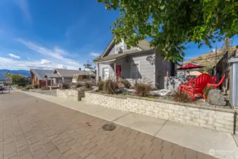 Front yard with large side walk and low Maintenace yard.