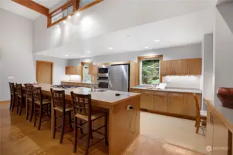 Clear story windows above the kitchen, too, plus windows overlooking the side yard