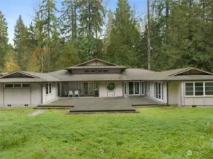 This stunning home wraps around the center courtyard with access from all three sides