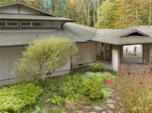 Breezeway from the front door to the 3-car garage is covered