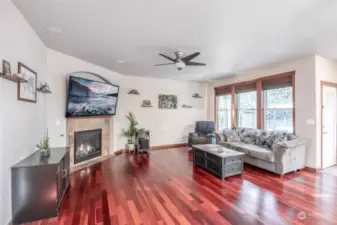 Living room with beautiful cherry wood flooring