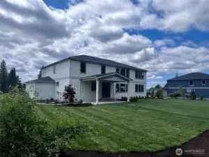Covered Patio looks out on full one acre parcel. Photos are for representational purposes only.  Colors and options may vary.