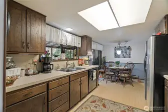 Enjoy the warm welcoming feeling of this large open galley kitchen. Watch the families of deer wander through your back yard from the kitchen windows.