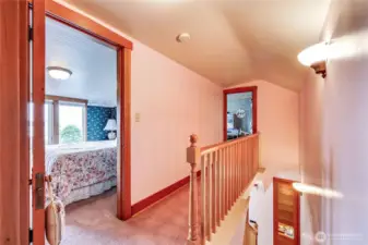 At the top of the stairs is the 1st bedroom.