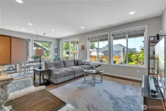 Living Room bathed in natural light. Sliding door exits to back yard with greenbelt (and winter peeks at Mt. Rainier) to the southeast.