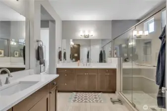 Primary Bath with walk-in Shower, Dual Vanity, Private WC, and expansive walk-in Closet.