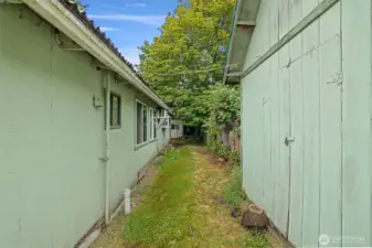 Large storage shed behind the house